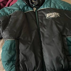 Philadelphia Eagles men jacket. Embroidered logos. Sz medium. NFL emblem on arm.